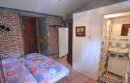 Bedroom 3 Cozy Holiday Home in Bergen op Zoom With Garden