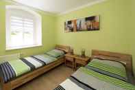Kamar Tidur Modernly Furnished Apartment in the Ore Mountains With use of Garden