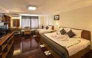 Kamar Tidur 7 Lin Unity Win Hotel