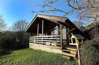 Exterior Cosy Modern Nordic Lodge w Loch View & Log Burner