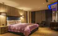Kamar Tidur 3 Mu Yue Jingpin Motel