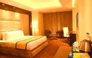 Bedroom 2 The Gulmohar Grand Hotel