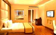 Bedroom 4 The Gulmohar Grand Hotel