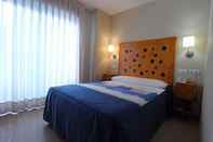 ห้องนอน Hotel Quatre Llunes