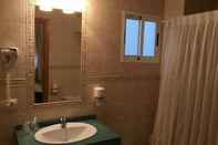 ห้องน้ำภายในห้อง Hotel Quatre Llunes