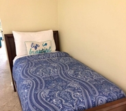 Bedroom 3 Emerald Beach by Forehand Rentals