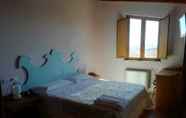 Phòng ngủ 2 Villa Tardioli Affittacamere
