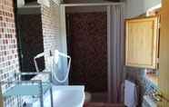 Phòng tắm bên trong 5 Villa Tardioli Affittacamere