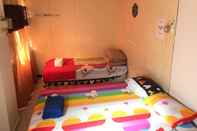 Kamar Tidur Pesona Backpackers Inn