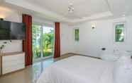 Bedroom 4 Coral Cove Beachfront Villa - Hotel Managed