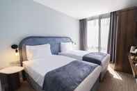 Kamar Tidur The Mori Club Hotel