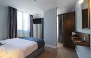 Kamar Tidur 6 The Mori Club Hotel