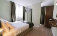 Kamar Tidur 7 The Mori Club Hotel