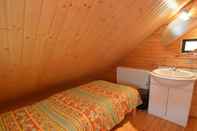 Bedroom A Wooden Chalet Located in a Quiet and Green Environment, for 5 People
