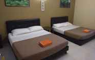 Kamar Tidur 4 Eight Mentigi Guesthouse