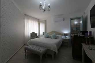 Kamar Tidur 4 Tzel Hailan Boutique suites