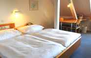 ห้องนอน 7 Hotel und Seminarhaus Ländli