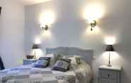 Kamar Tidur 6 Bed and Breakfast Les 5 Arches