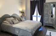 Kamar Tidur 5 Bed and Breakfast Les 5 Arches