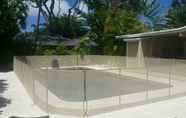 ห้องออกกำลังกาย 3 Kailua Beachside 4 Bedroom Home by Redawning