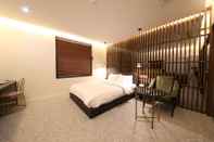 Kamar Tidur DIVINE Hotel