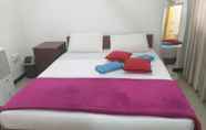 Kamar Tidur 7 59B Rest Inn Ella