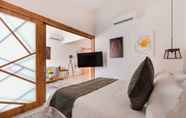Bedroom 5 C A L Suites