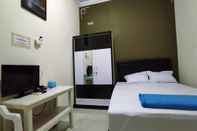 Kamar Tidur Homestay Menspul 27