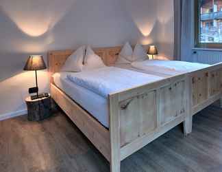 Bedroom 2 Brand new 70sqm Apartment, 1 km From Lake Carezza, in the Dolomites