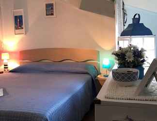 Kamar Tidur 2 Faro Bianco Bb Fronte Mare