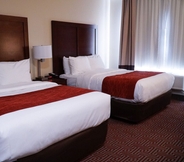 Bilik Tidur 3 Lotus BLU Inn & Suites