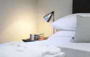 Kamar Tidur 4 Stylish Wood Street Apartment