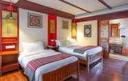 Bedroom 2 Floral Hotel · Yi Xing Lijiang