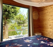 ห้องนอน 6 Tui Ridge Eco Cabins