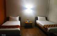 ห้องนอน 4 Sunrise Square Motel