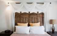 Kamar Tidur 2 Boho Room in the City With Remarkable Rooftop