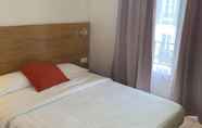 Bedroom 4 Dupleix Hotel