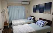 Kamar Tidur 2 I Am Home Guest House  103