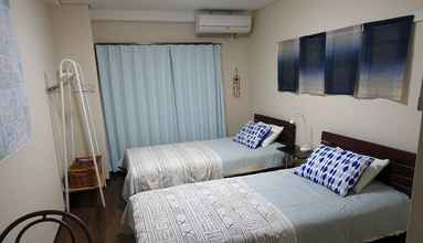 Kamar Tidur 4 I Am Home Guest House  103