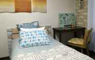 Kamar Tidur 2 I Am Home Guest House 202