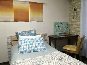 Kamar Tidur 4 I Am Home Guest House 202