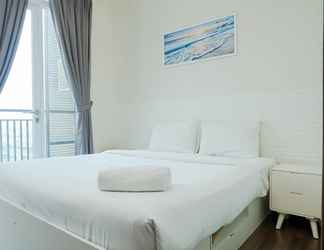 Bedroom 2 Minimalist and Relaxing 1BR Apartment at Puri Orchard