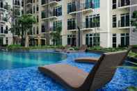 Swimming Pool Minimalist and Relaxing 1BR Apartment at Puri Orchard