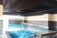 Swimming Pool Trendy & Comfy Studio at Tamansari La Grande Apartment