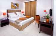 Bedroom 5 Corp Executive Hotel Doha Suites