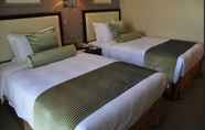 Kamar Tidur 2 Regal Plaza Hotel & Residence
