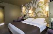 Bedroom 4 Gardette Park Hotel