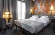 Bedroom 6 Gardette Park Hotel