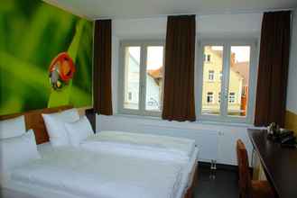 Bedroom 4 Hezelhof's Radl-Hotel