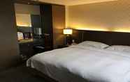 Kamar Tidur 7 The Metro Hotel